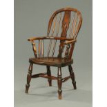 A 19th century child's Windsor armchair, with tall pierced back,