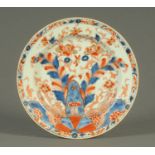 A late 18th/early 19th century Chinese Imari patterned plate. Diameter 27.5 cm.
