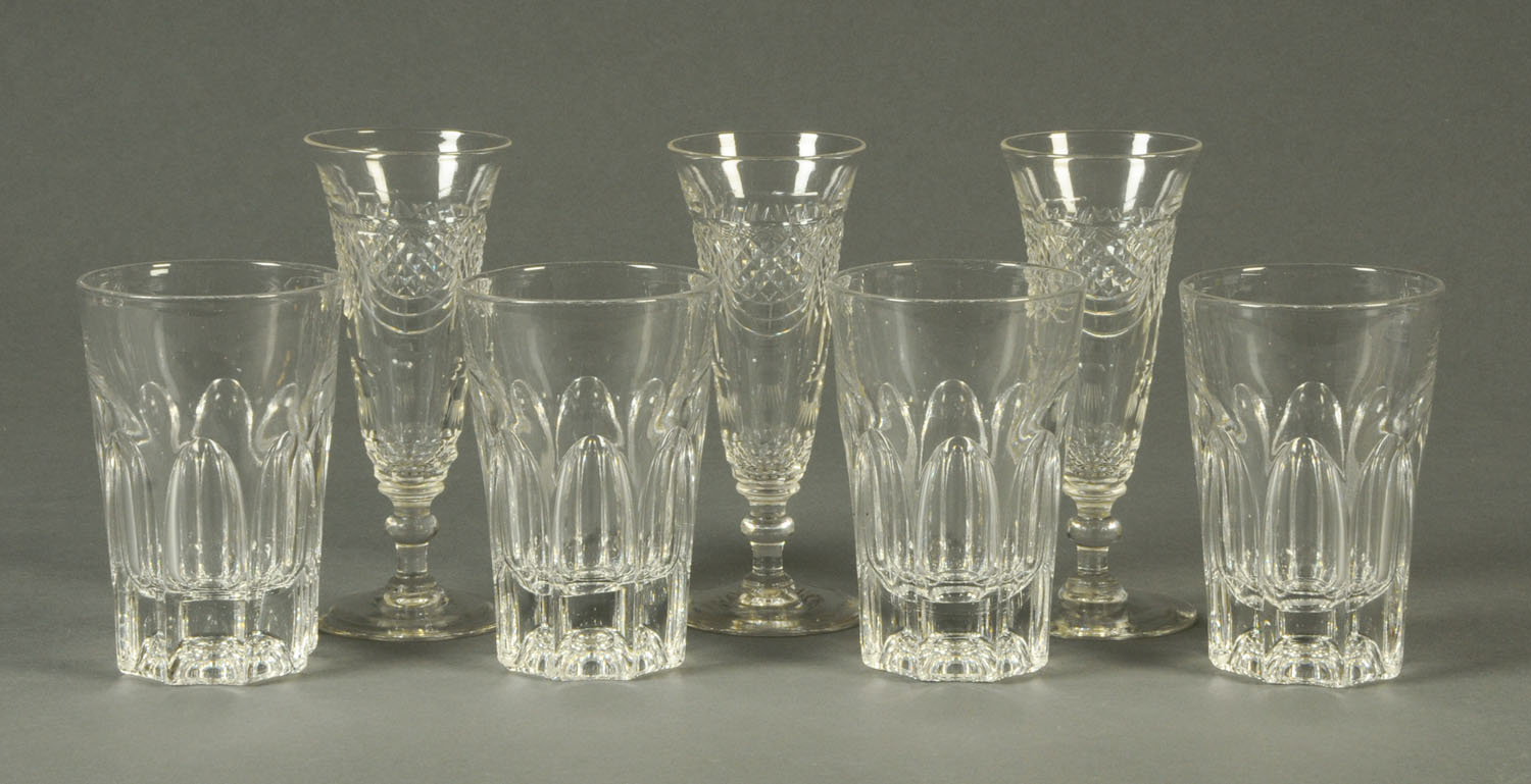 Four heavy Victorian faceted tumblers, and three cut champagne flutes.