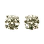 A pair of 18 ct white gold stud earrings, set with diamonds weighing +/- .60 carats.