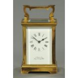 A carriage clock, by L. Reich & Sons, Tunbridge Wells, modern. Height excluding carrying handle 11.