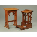 Two oak lecterns, one with Gothic carving.