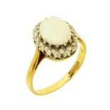 A 9 ct gold opal cluster ring, size L/M.