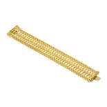 A 14 ct yellow gold bracelet, stamped "585", 2.5 cm x 8.5 cm, 35.33 grams (see illustration).