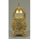 An early 20th century brass lantern clock, with Winterhalder & Hofmeier two-train movement,