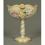 A Victorian glass vase, decorated with birds and flowers and on tall stem with circular foot.