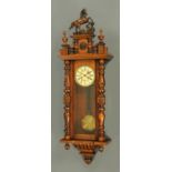 A late Victorian walnut Vienna style regulator wall clock,