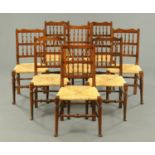 A set of eight Lancashire style rush seated spindle back chairs,