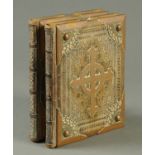 Two brass and leather bound volumes "The Communion Etc.".