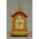 A late 19th/early 20th century oak bracket clock,