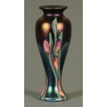 An Okra vase, with stylised foliate decoration, signed to the base.