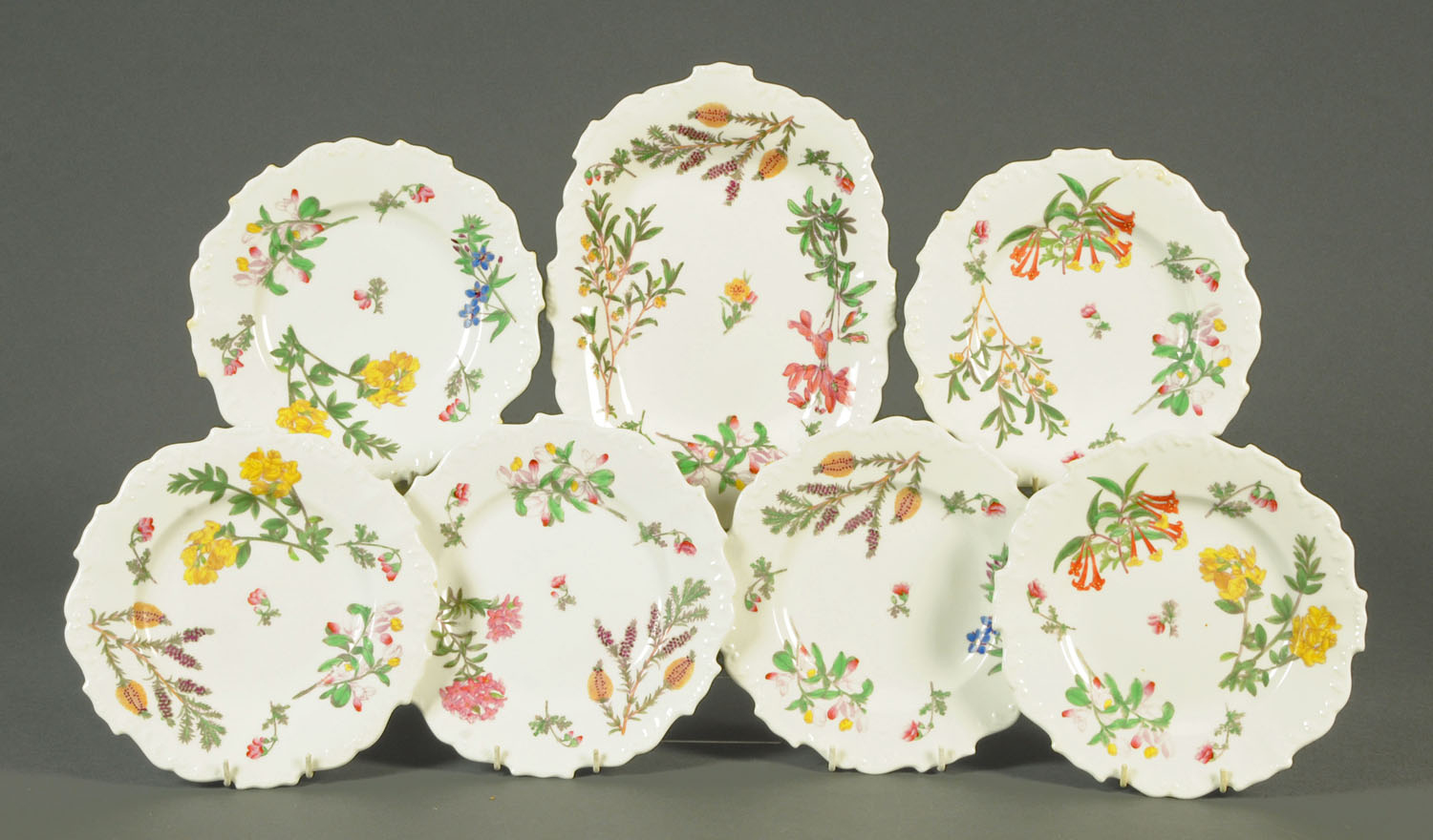 A 19th century dessert service, handpainted with floral sprays,