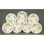 A 19th century dessert service, handpainted with floral sprays,