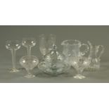 A collection of cut glassware, comprising pair of vases, two jugs, celery vase,