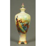 A Royal Worcester vase, decorated with a peacock and signed "C. White".