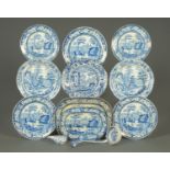 A Copeland Spode's Italian blue and white shaped plate, seven further plates with dog rose borders,