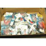 Box of +/- 120 assorted sea rigs, squids, lures, etc.