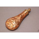 Bartrum & Co. brass and copper powder flask, copper body embossed with stag, oak leaves, fox, etc.