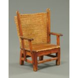 A late 19th century child's Orkney chair, typical form, with rush back,
