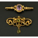 A Victorian 9 ct gold peridot and seed pearl pendant, and a 9 ct gold amethyst bar brooch.