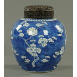 A 19th century Chinese Prunus vase, with Zitan lid. Height 30 cm (see illustration).