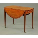 A George III Sheraton period Pembroke table, large form, oval in plan and with crossbanded edge,