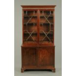 A mahogany bookcase, in the Georgian style,