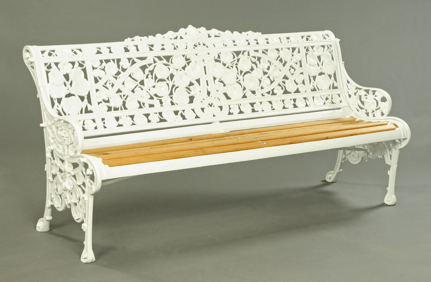 A Victorian Coalbrookdale Nasturtium pattern cast iron bench, marked "CBDALE Co, No.