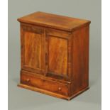 An early Victorian mahogany collectors' cabinet, table top form,