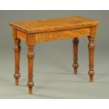 An oak turnover top rectangular card table, raised on four turned legs. Width 91.5 cm.