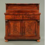 A Victorian mahogany chiffonier, with rear upstand, crossbanded edge, two frieze drawers,