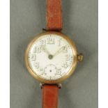 A First World War period 9 ct gold cased Rolex gentleman's wristwatch, dated 1915, 15 jewels.