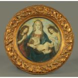 A gilt framed print after Botticelli. Diameter 40 cm.