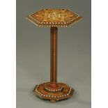 A late 19th century Moorish hexagonal occasional table, inlaid with bone and specimen wood.