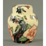 A Moorcroft ginger jar, by Emma Bossons. Height 17 cm.