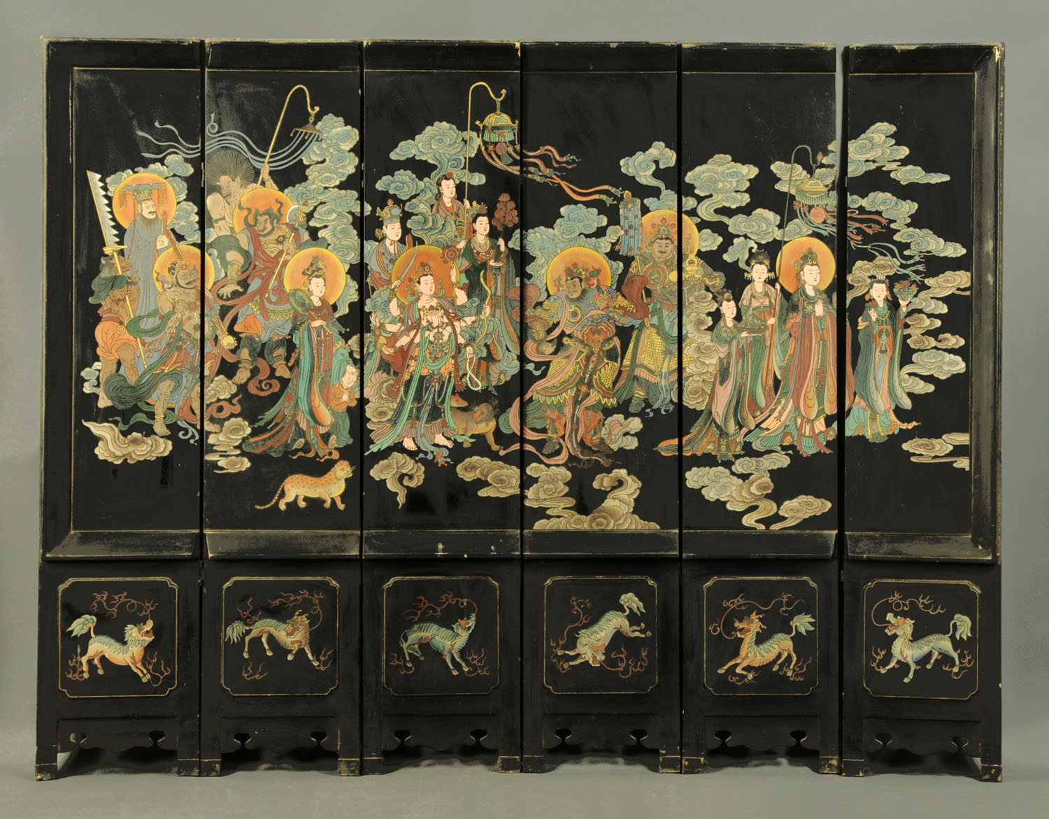 A Chinese folding screen, decorated with figures and dogs, six fold.
