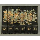 A Chinese folding screen, decorated with figures and dogs, six fold.