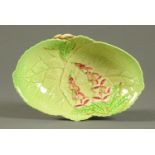 A Carltonware leaf and foxglove moulded dish. Length 24 cm.