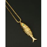 WITHDRAWN - A 9 ct gold articulated fish pendant, with 9 ct gold box link chain,