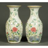 A pair of 19th century Famille Rose vases, decorated with carnations, four character mark to base.