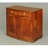 A Regency mahogany bowfronted cupboard,