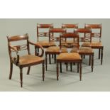 A set of one carver arm and six single Regency mahogany dining chairs, Whitehaven design,