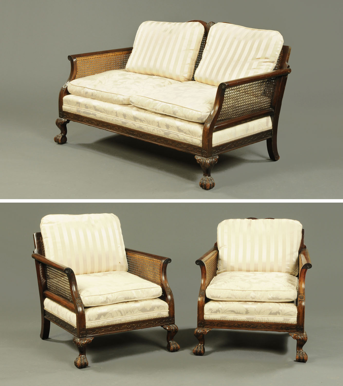 An early 20th century mahogany three piece Bergere lounge suite,