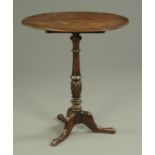 A Georgian mahogany oval tripod table,