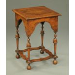 A walnut Queen Anne style side table, circa 1930, with turned legs and low shaped stretchers.