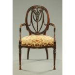 A Hepplewhite style mahogany occasional chair.