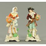 A pair of continental porcelain figurines, gentleman with game bird and companion. Height 23 cm.