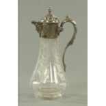 A 19th century cut glass French claret jug, with silver plated mounts.