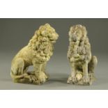 A pair of simulated sandstone garden lion ornaments. Height 59 cm (see illustration).