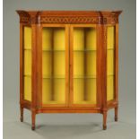 An Edwardian inlaid mahogany display case.